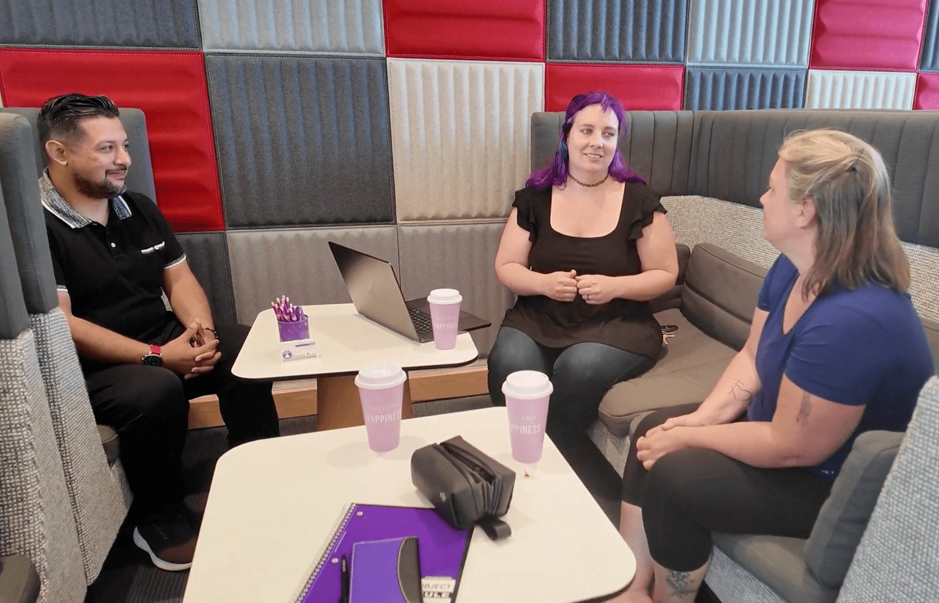 Two women talking in a coworking space
